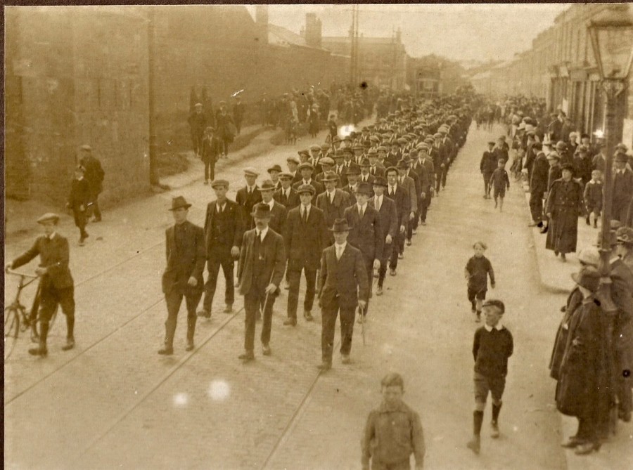 During the War of Independence, the funeral of IRA member Sean Doyle is led by F Company 4th Battalion, in 1920. The procession is walking along Emmet Road in Inchicore  and Richmond Barracks is on the left. Credit: Diarmuid O’Connor/Ken Larkin.