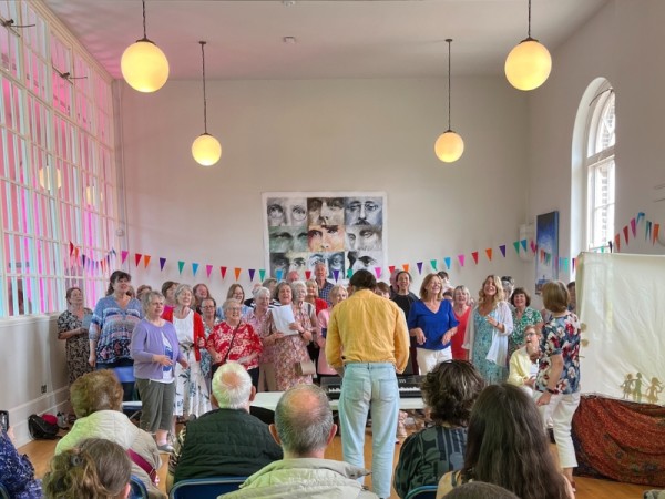 A choir singing to an audience.
